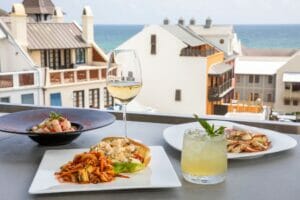 rosemary beach enjoying wine and eating dinner 30a